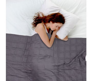 De SleepMed Luxe Verzwaringsdeken biedt een diepe druk stimulatie voor een betere slaap.